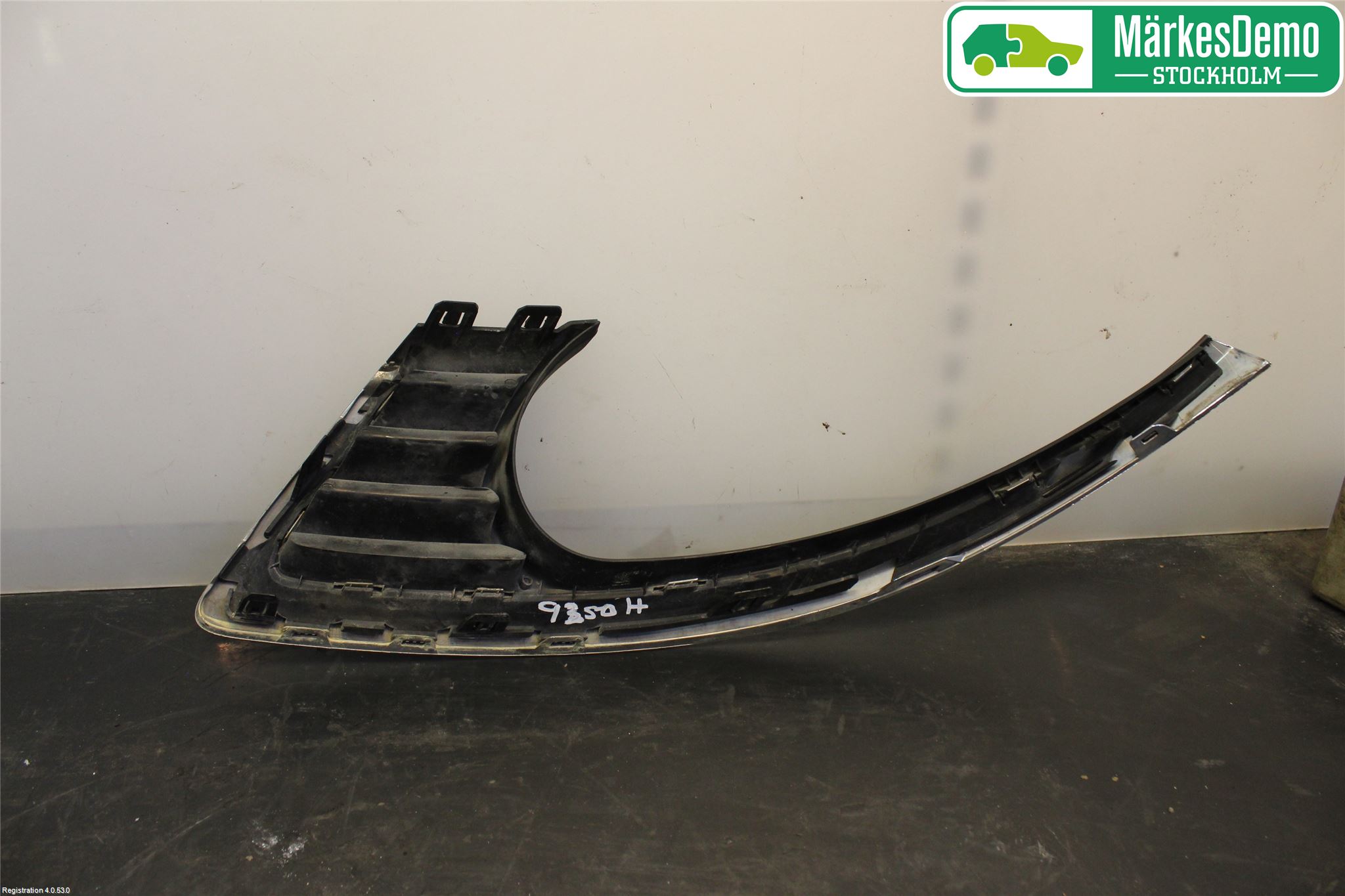 Saab 9-5     06-10 Frontlykt Ramme H Lyktering