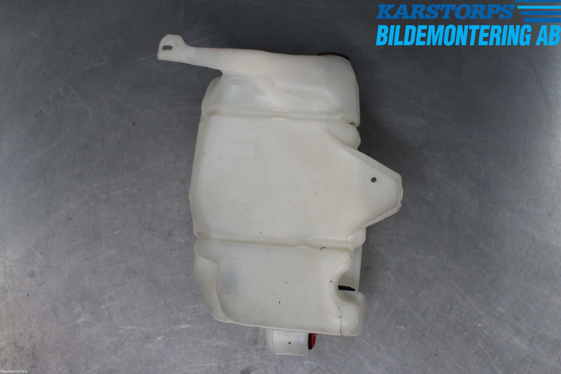 Volvo V50 04-07 Spylerbeholder Frontrute-Lykte